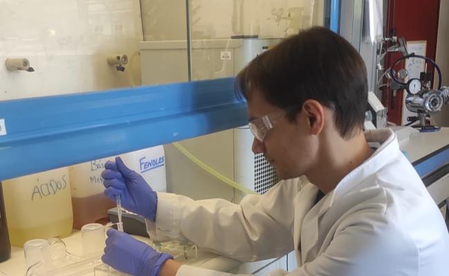 Dr. Loukopoulos working at the lab